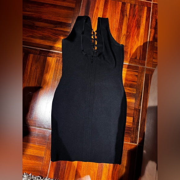 French Kiss Black dress with circle design in front - Picture 2 of 3